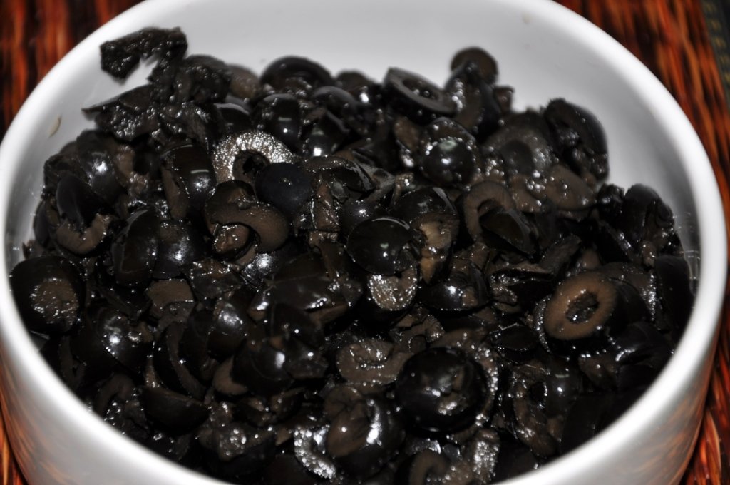 halved black olives