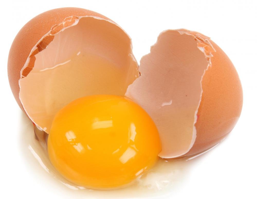A cracked egg with the white and yolk