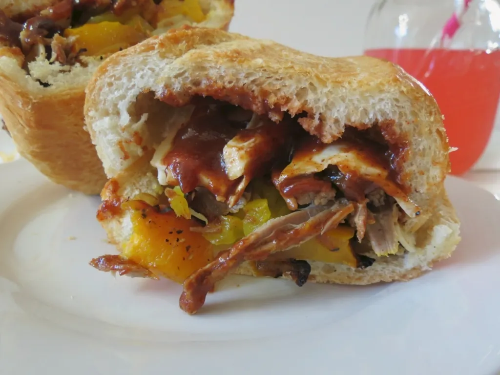 Grilled Tri Tip with Roasted Peppers and Onions Sandwich