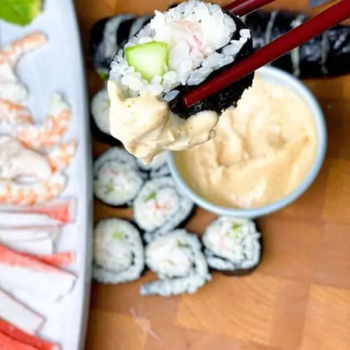a sushi roll with sauce