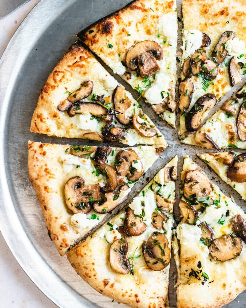 A Mushroom Pizza with Fresh Herbs