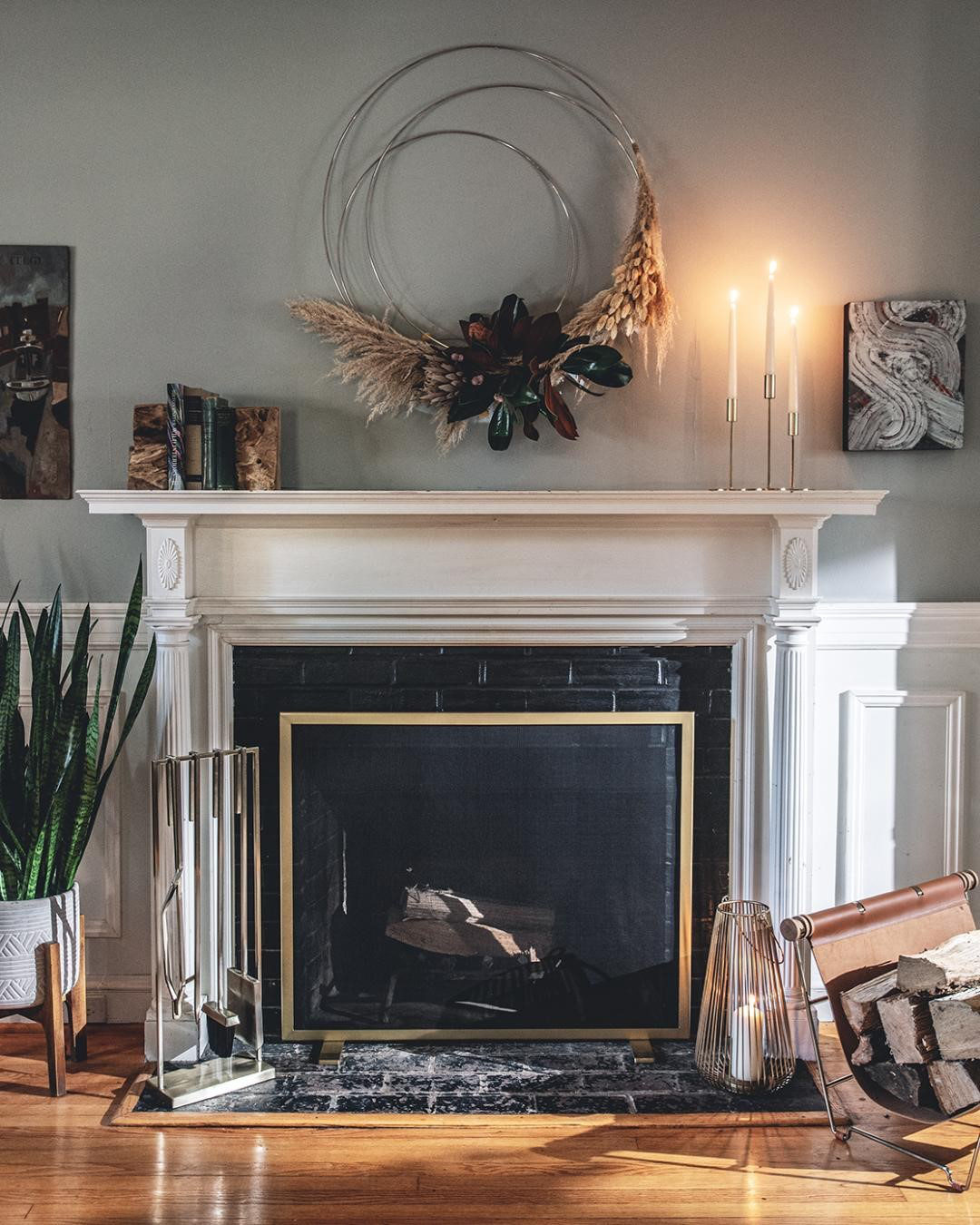 a vintage living room with a fireplace screen