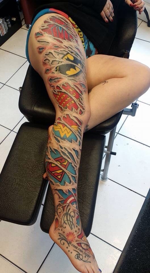 comic book characters leg sleeve tattoo
