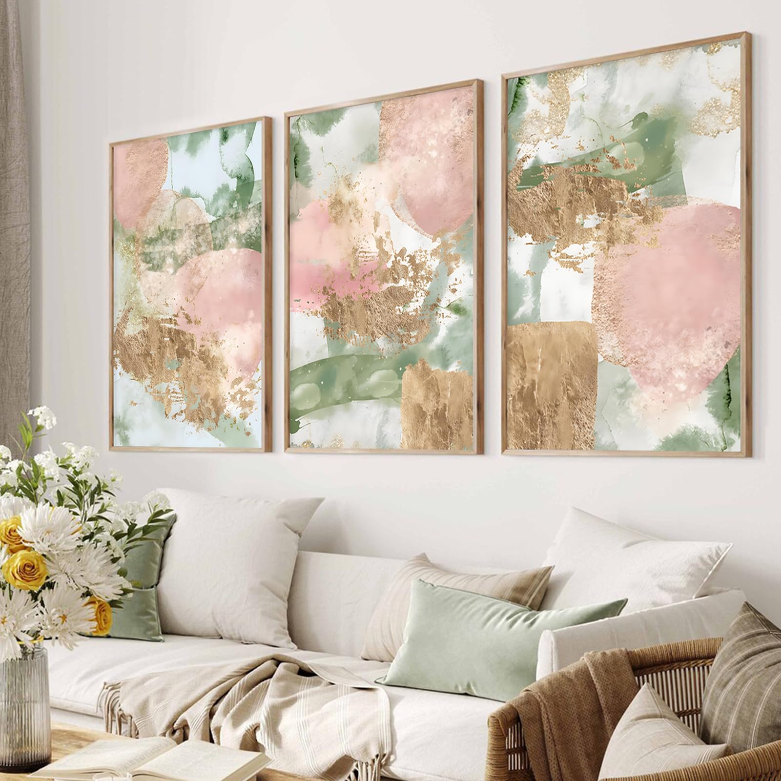 a pink and green living room with pink abstract art