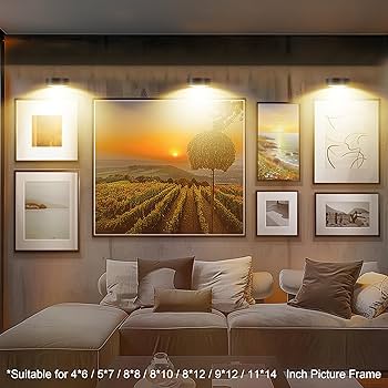 living room with picture light wall lamps for art display