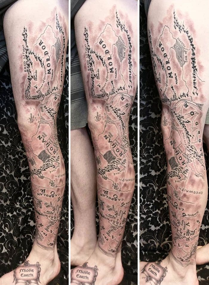 map of the world leg sleeve tattoo