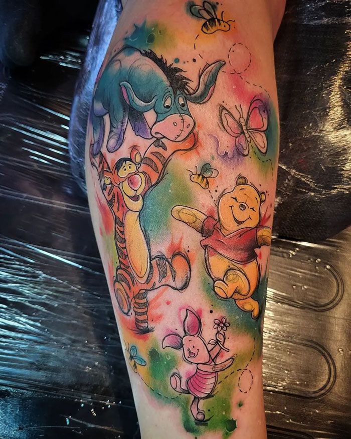 leg pooh tattoo