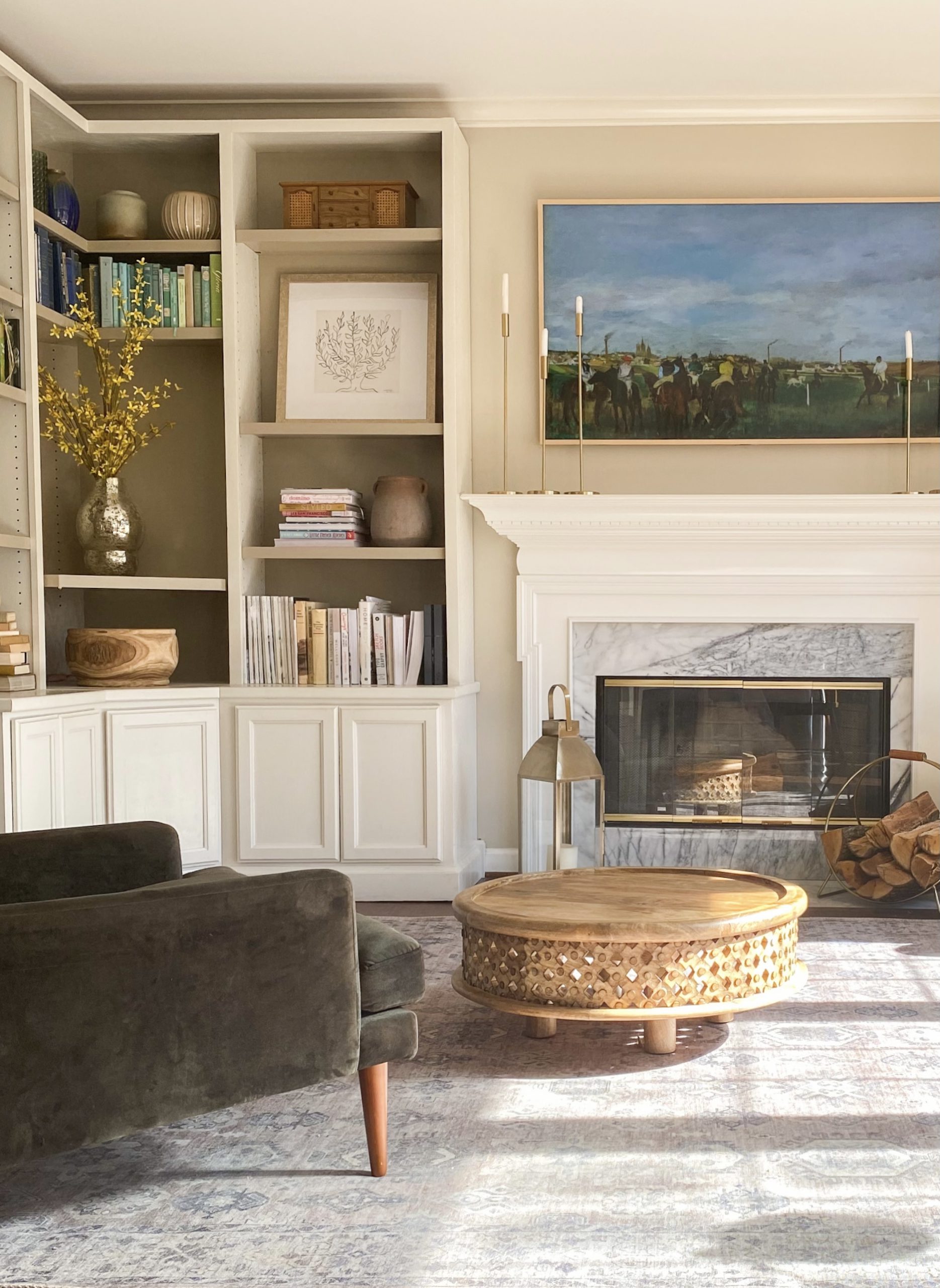 a vintage living room with antique books