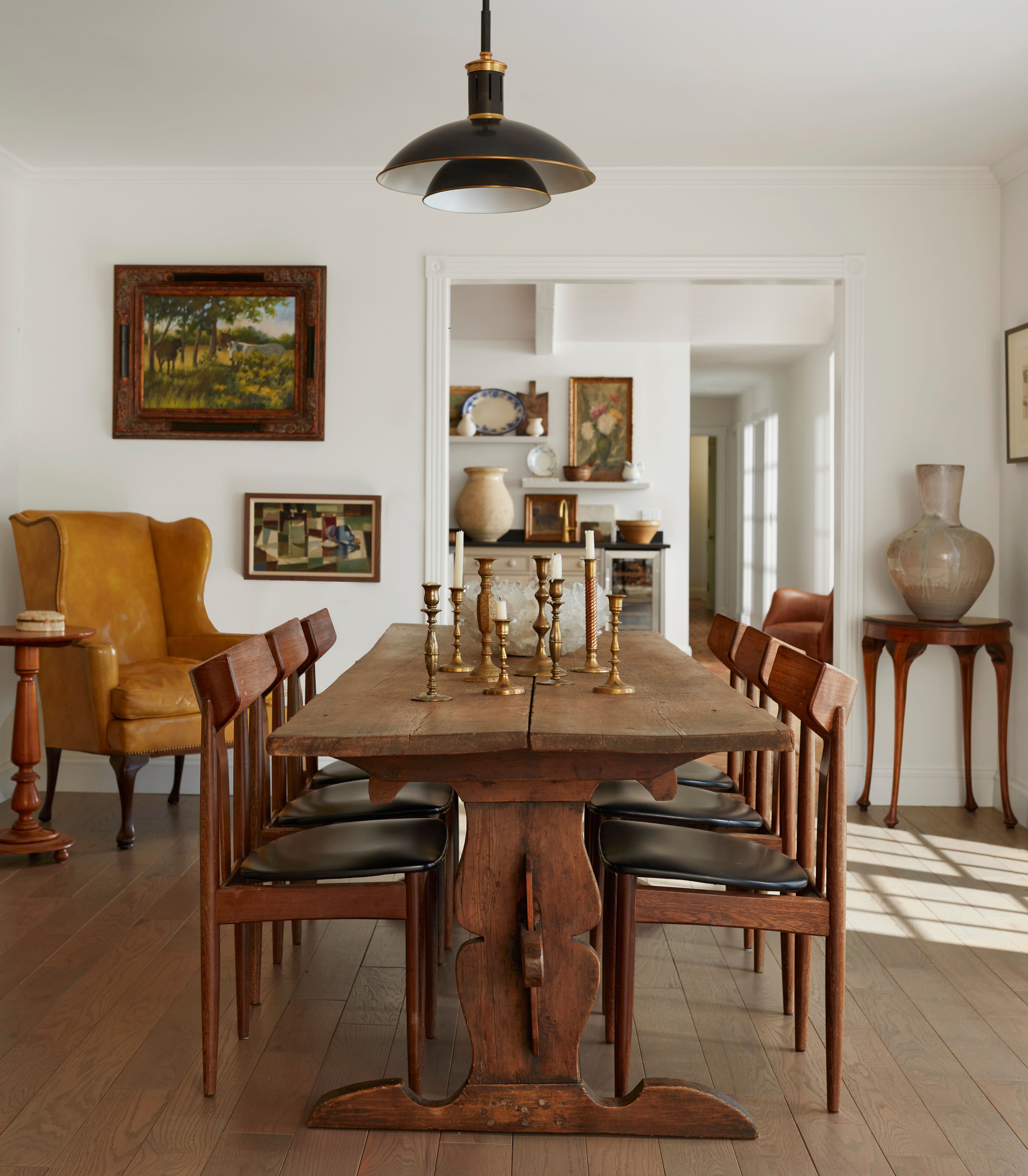 a vintage living room with brass accents