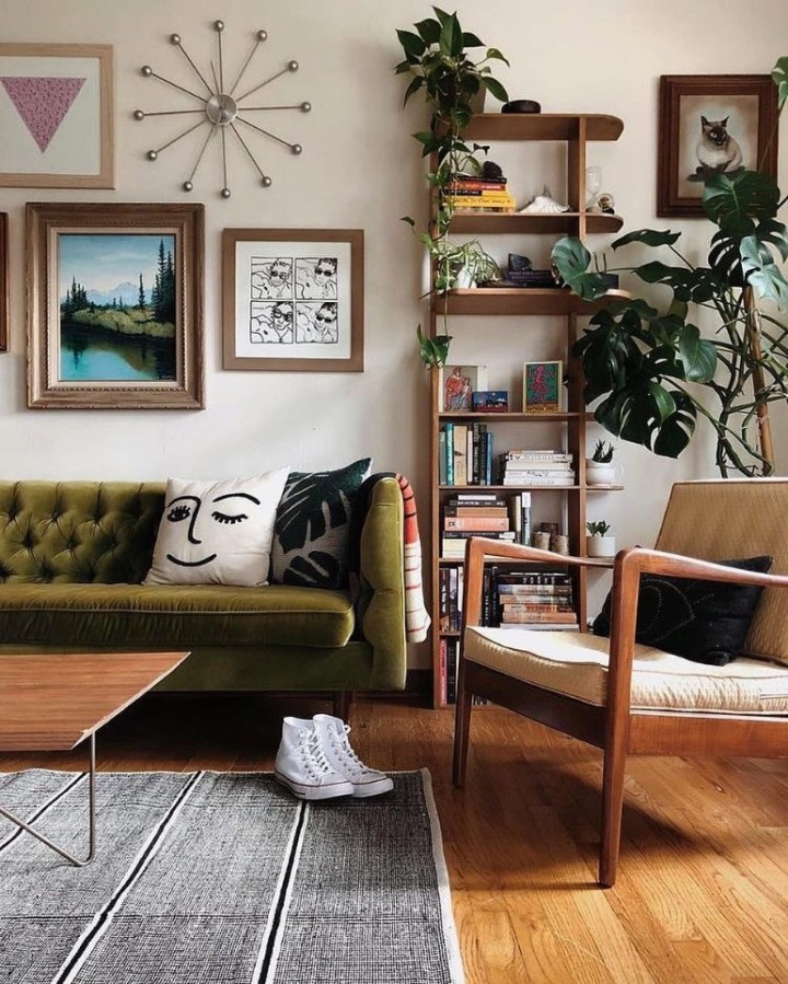 living room with mid-century modern green and brown color palette with tapered legs