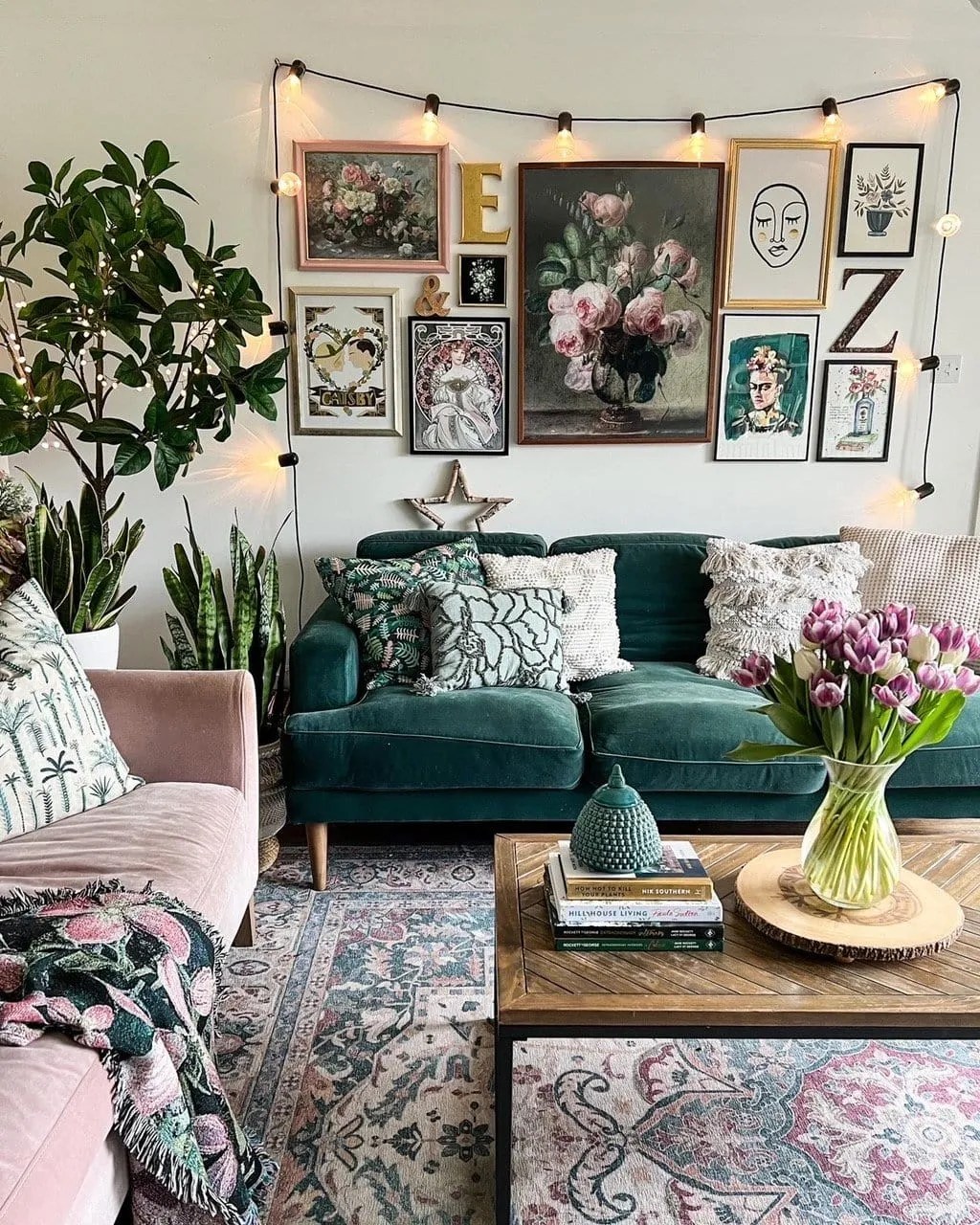 a pink and green living room with pink vases