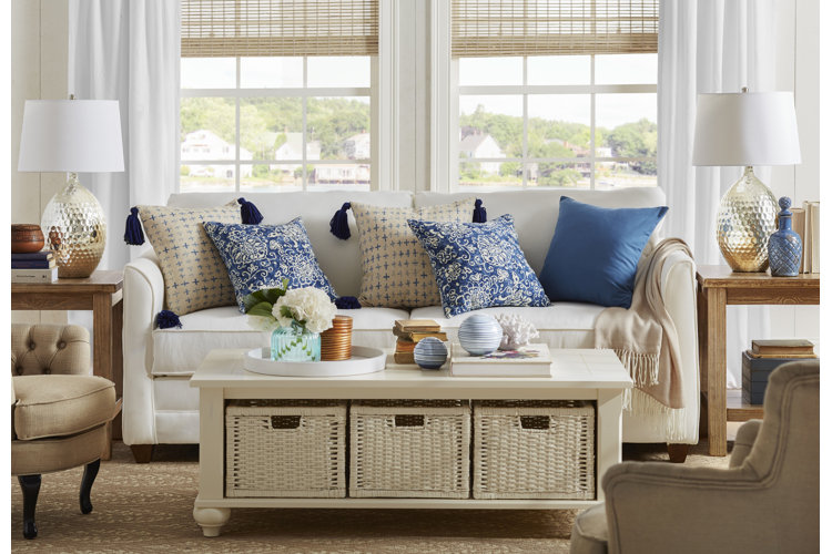 living room with farmhouse cream denim sofa with throw pillows