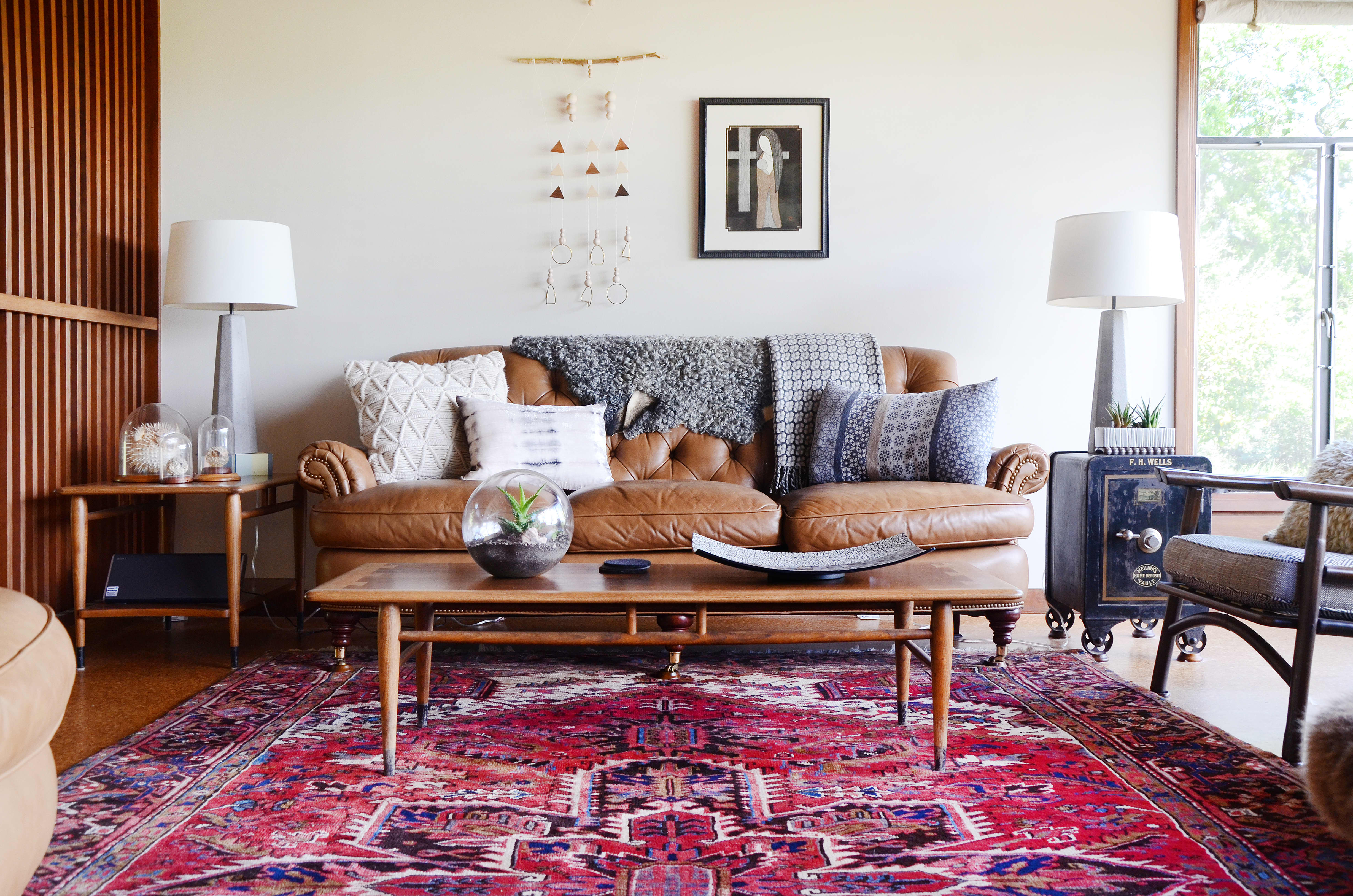 a vintage living room with a Persian rug