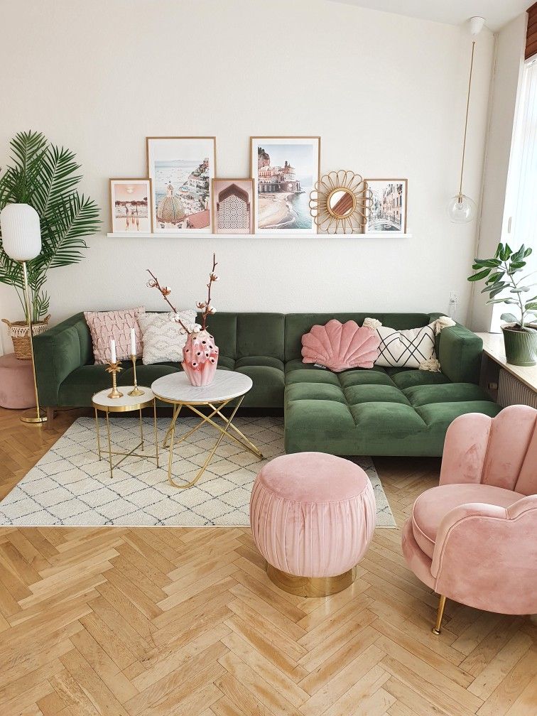 a pink and green living room with pink ottoman