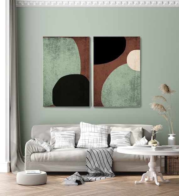 living room with contemporary green and brown color palette with abstract art