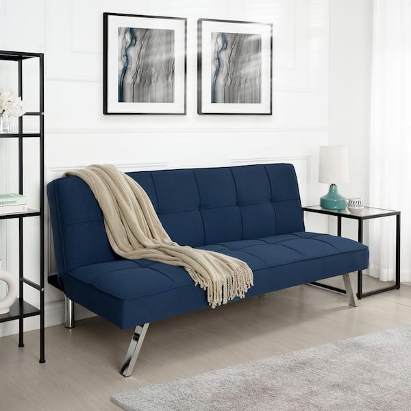 living room with navy blue futon in a multi-purpose room