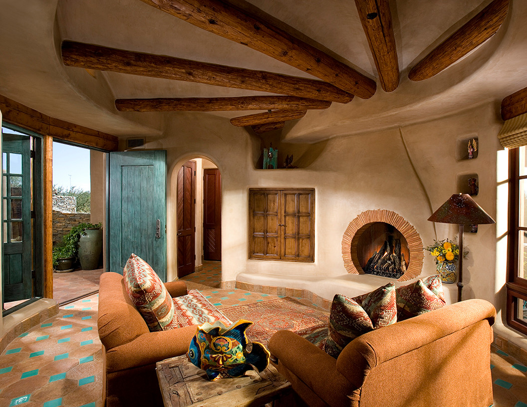 living room with southwestern green and brown color palette with terracotta tiles