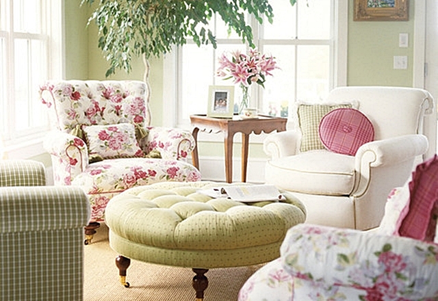 a pink and green living room with pink trim