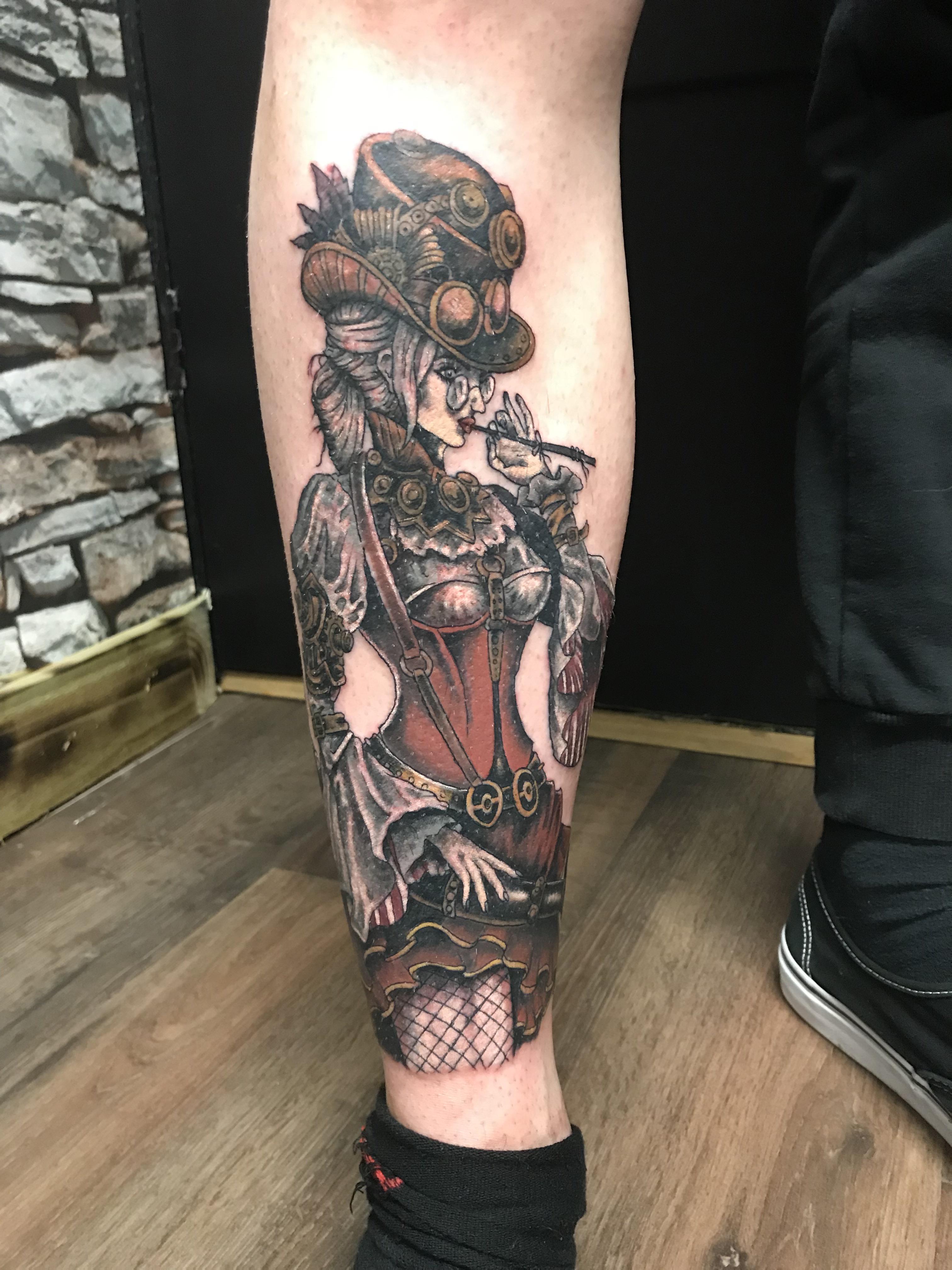 steampunk theme leg sleeve tattoo