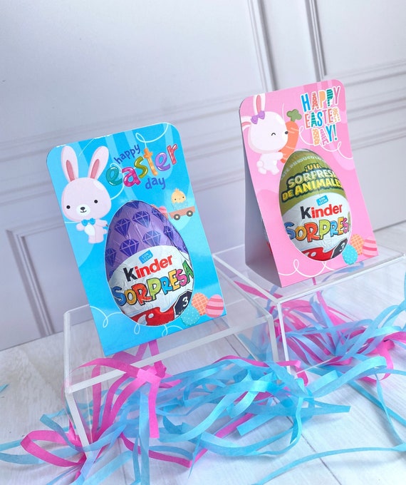 a colorful display with Kinder Surprise Eggs