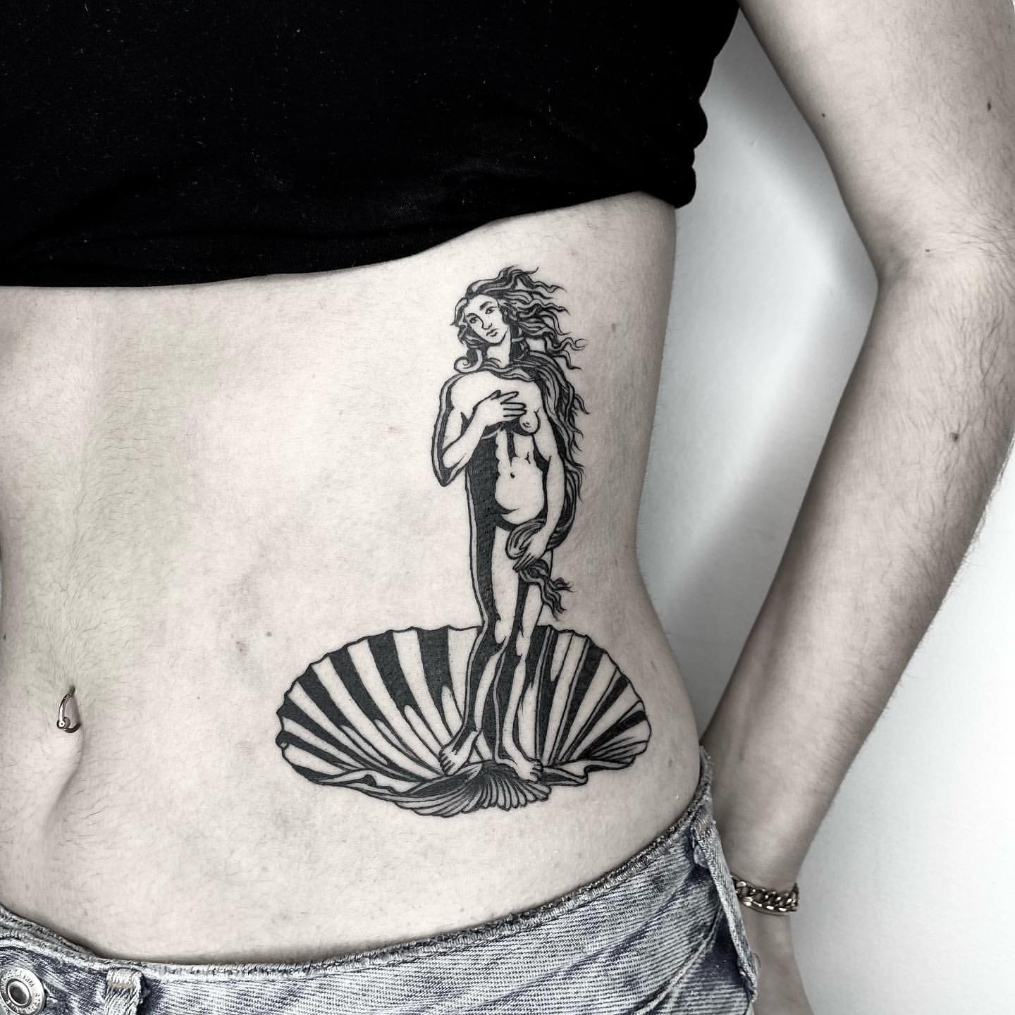 Aphrodite rising from the sea in one clean silhouette