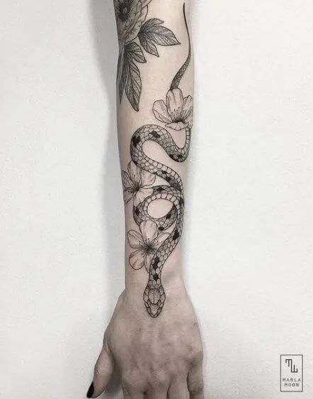 A full snake sleeve that turns your arm into a statement
