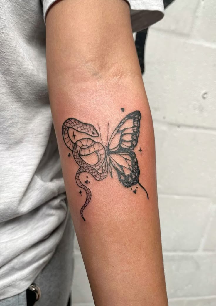 A snake and butterfly that’s transformation with teeth