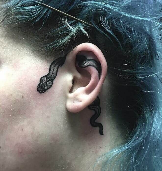 A snake behind the ear that feels like a warning