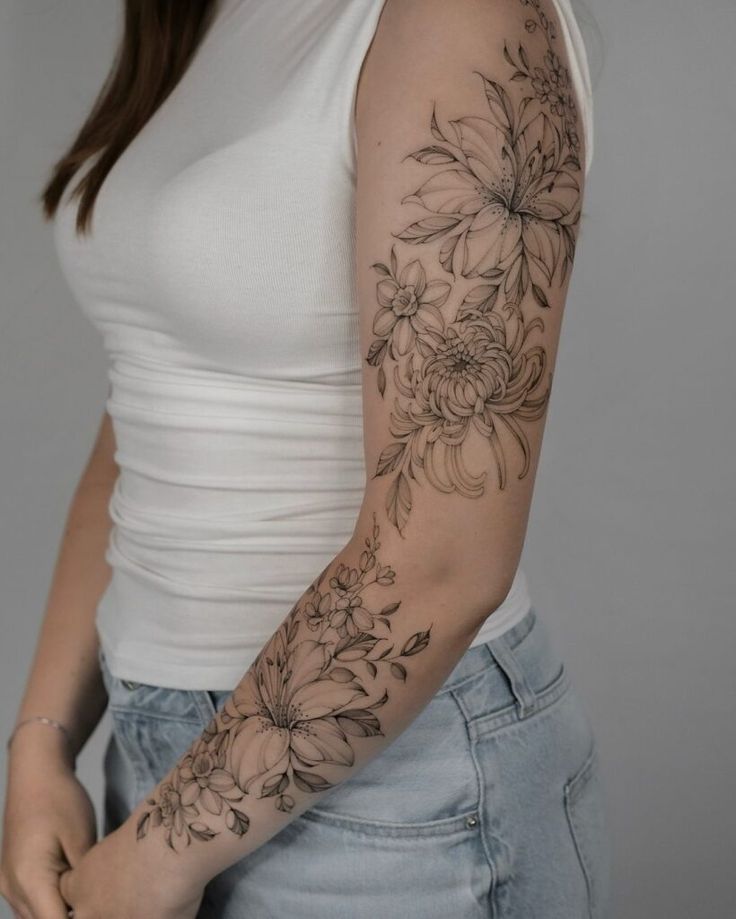 Fine-line botanical sleeve that still hits hard