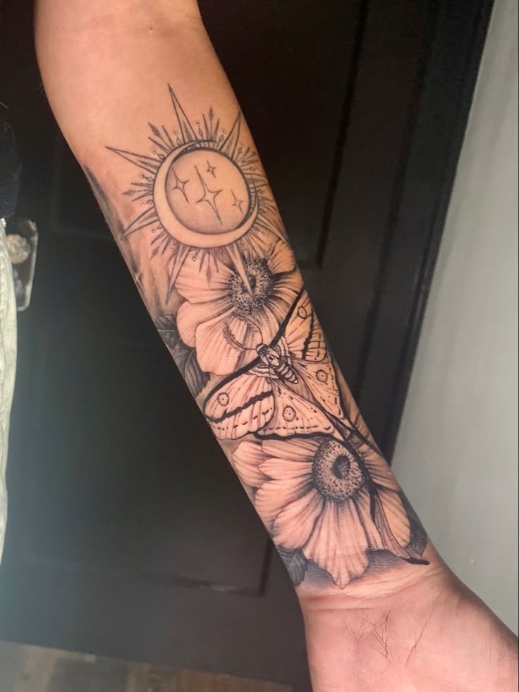 Moth and moon sleeve with eerie elegance