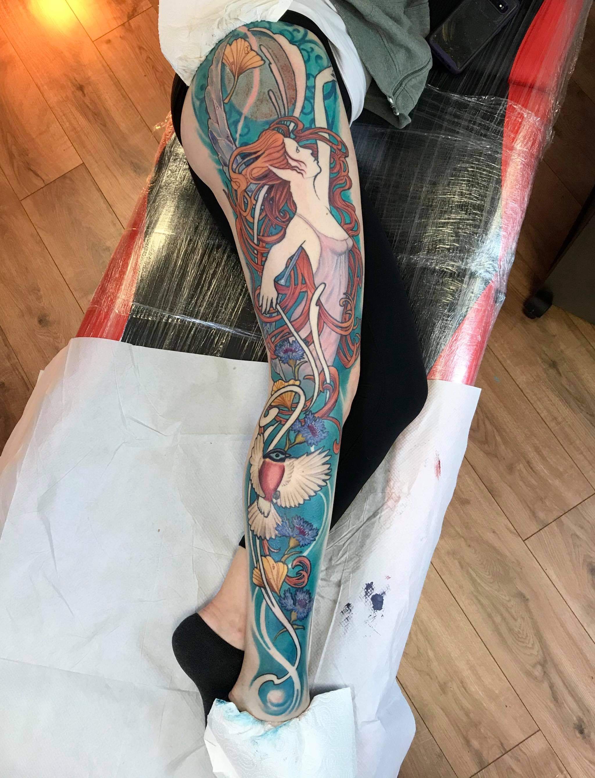 Art Nouveau sleeve with flowing hair and ornate frames