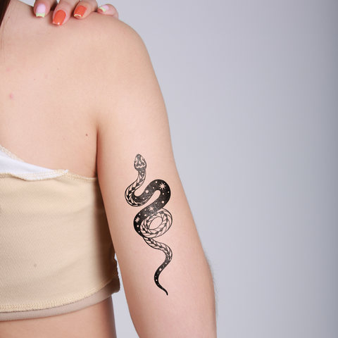A snake with ornamental filigree that feels like lace